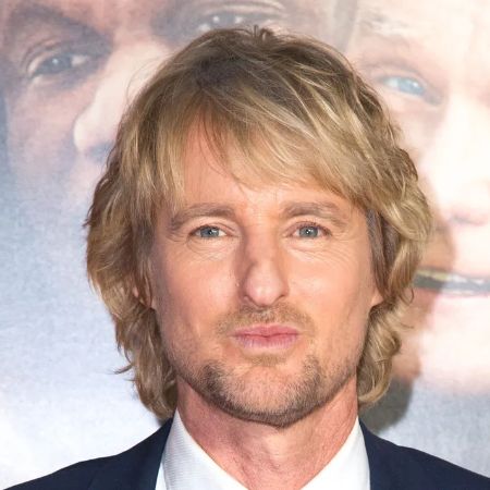 Owen Wilson wears a suit for an event.